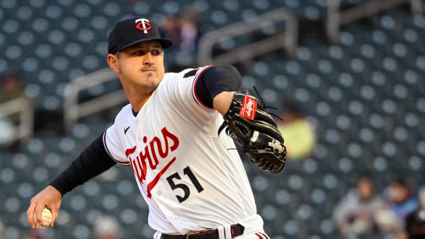 Apr 21, 2023; Minneapolis, Minnesota, USA; Minnesota Twins pitcher Tyler Mahle (51) delivers a pitch against the Washington Nationals at Target Field. Mandatory Credit: Nick Wosika-USA TODAY Sports  